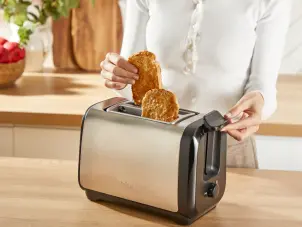 Тостер Tefal Subito 1100Вт, розморожування, щипці, нерж. сталь, чорний №3