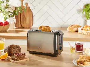 Тостер Tefal Subito 1100Вт, розморожування, щипці, нерж. сталь, чорний №7