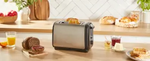 Тостер Tefal Subito 1100Вт, розморожування, щипці, нерж. сталь, чорний №9