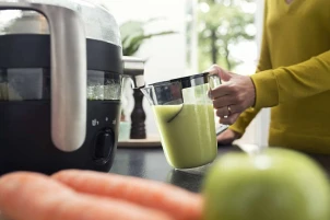 Соковитискач Philips Avance Collection відцентрований 1000Вт, чаша-1л, жмих-2.1л, жолоб на ціле яблуко, пластик, чорний №7