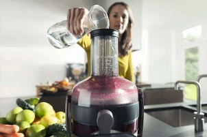 Соковитискач Philips Avance Collection відцентрований 1000Вт, чаша-1л, жмих-2.1л, жолоб на ціле яблуко, пластик, чорний №9