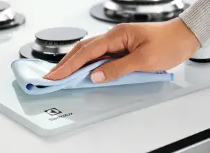 Варочная поверхность Electrolux газовая на стекле, 60см, чугун, белый №3