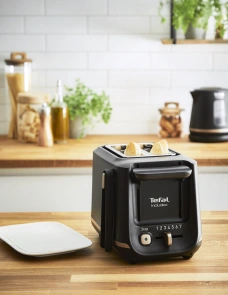 Тостер Tefal Includeo 850Вт, розморожування, щипці, термопластик, чорний №3